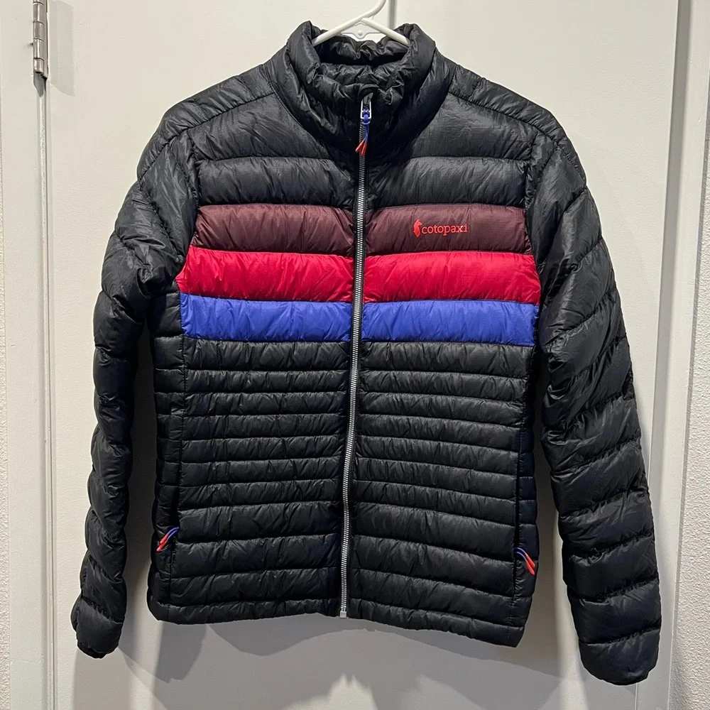 Cotopaxi Woman’s Down Fuego Black Jacket with Red & Blue Stripes - Picture 1 of 3